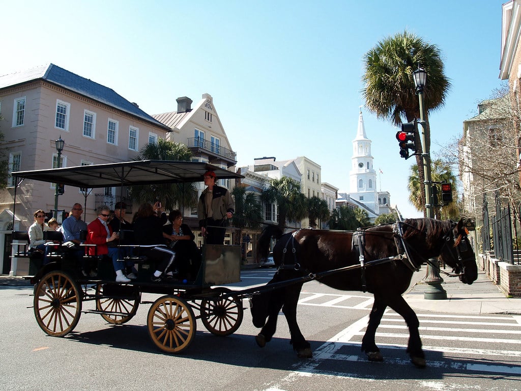 Charleston SC, horse-drawn carriage crossing broad